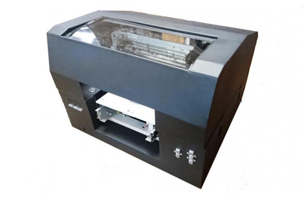 Изображение Планшетный принтер УФ А4 на базе Epson L800